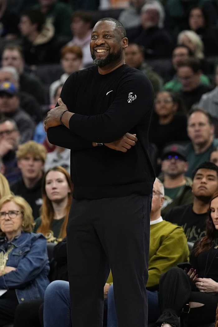 Milwaukee Bucks head coach Adrian Griffin smiles